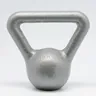 Single cast-iron kettlebell on a white background (illustrative photo)